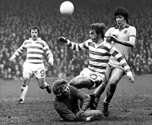 Partick Thistle's keeper Alan Rough makes a save at the feet of Kenny Dalgish Partick Thistle's keeper Alan Rough makes a save at the feet of Kenny Dalgish