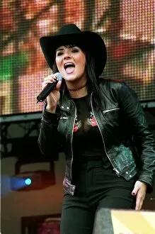Images Dated 4th July 1999: Party in the Park - Martine McCutcheon July 1999 performing to an audience of 100