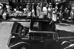 Patients from the Children's Hospital watch Princess Elizabeth as she passes through Patients from the Children's Hospital watch Princess Elizabeth as she passes through