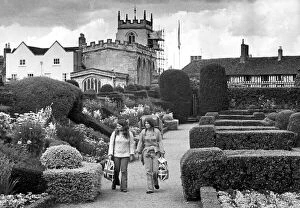 Images Dated 10th August 1972: Two patriotic tourists take a stroll through the peaceful surroundings of New Place