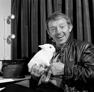 Images Dated 27th November 1985: Paul Daniels with his pet rabbit Starsky. 27th November 1985