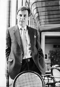 Paul Darrow actor - April 1985 Standing behind a chair at the Grand Theatre in