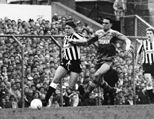 Paul Gascoigne, on the ball for Newcastle United, is chased by Wimbledon player Vinnie