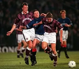 Images Dated 2nd December 1995: Paul Gascoigne is tackled by Steve Fulton and Gary Mackay Hearts Rangers Scottish