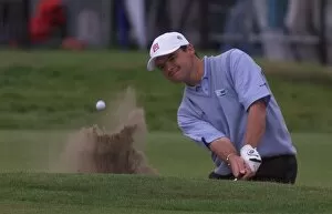 Images Dated 18th July 1999: Paul Lawrie plays out of a bunker on the 18th green July 1999