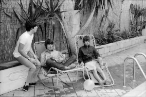 Paul McCartney, George Harrison and Ringo Starr relax on sun loungers at their rented Paul McCartney, George Harrison and Ringo Starr relax on sun loungers at their rented