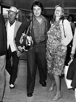 Paul McCartney, former singer with The Beatles and wife Linda at London Airport June