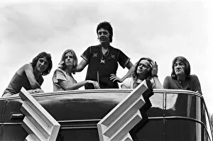 Images Dated 13th July 1972: Paul McCartney and his wife Linda in Paris, France, with other members of the group Wings