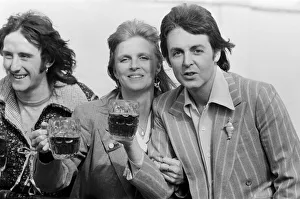 Paul McCartney and his wife Linda of pop group Wings enjoy a pint of ale as they make a Paul McCartney and his wife Linda of pop group Wings enjoy a pint of ale as they make a