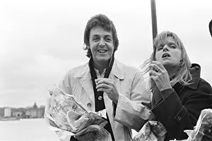Paul McCartney and his wife Linda of pop group Wings sailing down the River Thames Paul McCartney and his wife Linda of pop group Wings sailing down the River Thames