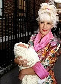 Paula Yates TV Presenter and Model leaving hospital with her new baby daughter