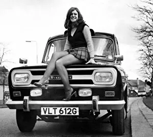 00666 Gallery: Pauline Greig, aged 17, of Fairfield, Liverpool, decorates the bonnet of the new taxi