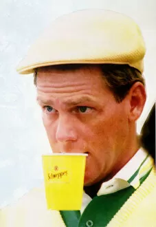 Payne Stewart Golfer July 1990 at St Andrews Scotland - with Schweppes Cup in Mouth