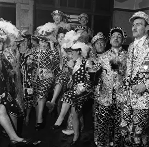 Pearly Kings and Queens celebrating in Hackney, East London. 24th March 1955 Pearly Kings and Queens celebrating in Hackney, East London. 24th March 1955