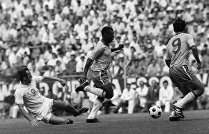 Images Dated 16th June 1970: Pele of Brazil goes past a Czechoslovakian defender June 1970 during