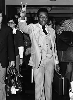 Images Dated 12th October 1977: Pele football player for Brazil arriving at Heathrow Airport from Lisbon 1977
