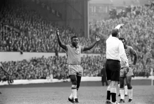 Pele July 1966 raises his hands as the referee awards a free kick in the Scotland v Pele July 1966 raises his hands as the referee awards a free kick in the Scotland v