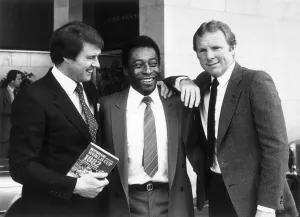 Pele teams up with old rivals Geoff Hurst left and Bobby Moore in London to promote Pele teams up with old rivals Geoff Hurst left and Bobby Moore in London to promote
