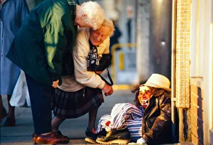 Penny for the guy on a South Wales street Two elderly ladies having a laugh at Guy Penny for the guy on a South Wales street Two elderly ladies having a laugh at Guy
