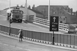 Images Dated 11th November 1974: People crossing the motorway dangerously, in the north of England. 11th November 1974
