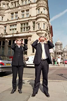 Images Dated 11th August 1999: People in Liverpool city centre watching the solar eclipse. 11th August 1999