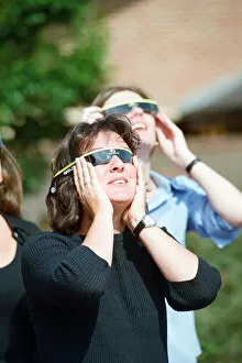 Images Dated 11th August 1999: People watching a total solar eclipse. 11th August 1999