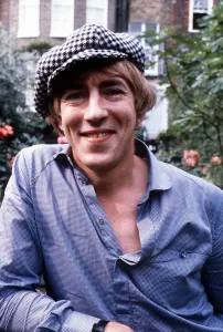 Peter Cook actor at home in his garden wearing a hat Peter Cook actor at home in his garden wearing a hat