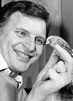 Images Dated 25th March 1986: Peter Dean actor in the soap Eastenders with one of his twenty four Canaries