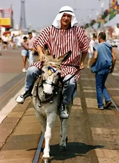 Peter Howitt Actor riding on a donkey A©Mirrorpix
