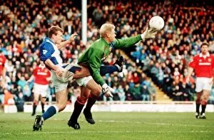 Images Dated 26th October 1992: Peter Schmeichel Manchester United goalkeeper in a tangle with Alan Shearer of Blackburn
