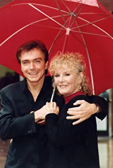 01478 Gallery: Petula Clark and David Cassidy under umbrella at photocall - July 1993