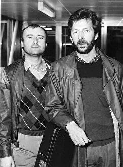 Images Dated 7th March 1984: Phil Collins with Eric Clapton at Heathrow