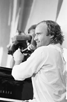 Phil Collins performing on stage at the John F. Kennedy Stadium, Philadelphia Phil Collins performing on stage at the John F. Kennedy Stadium, Philadelphia