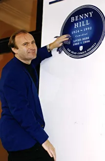 Phil Collins Polishes The Plaque In Rememberence Of The Late Benny Hill Actor Comedian Phil Collins Polishes The Plaque In Rememberence Of The Late Benny Hill Actor Comedian