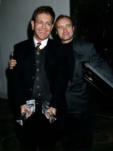 Phil Collins Singer and Elton John at award dinner at Park Lane Hotel Phil Collins Singer and Elton John at award dinner at Park Lane Hotel