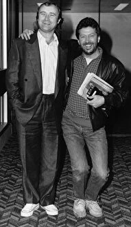 Images Dated 8th April 1987: Phil Collins singer with Eric Clapton in 1987