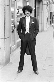 Phil Lynott of Thin Lizzy modelling clothes from Saville Row, London