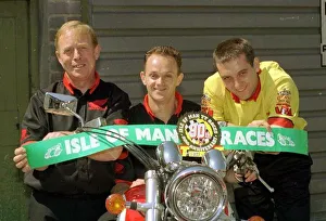 Phillip McCallen MotorCycle Racing centre celebrates his race victory after the 90th Phillip McCallen MotorCycle Racing centre celebrates his race victory after the 90th