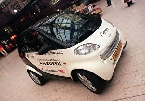 Images Dated 28th January 1999: Pic shows.... The Swatch smart car in Glasgow central station