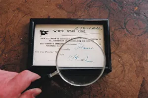 A picture of a ticket for a voyage on the ill-fated liner Titanic A picture of a ticket for a voyage on the ill-fated liner Titanic