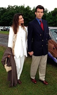 Images Dated 4th June 1995: Pierce Brosnan and Keely Shaye Smith arrive at the Alfred Dunhill Queens Cup Polo