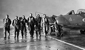 Pilots of 3613 Fighter Control Unit of the Royal Auxiliary Air Force make their way to Pilots of 3613 Fighter Control Unit of the Royal Auxiliary Air Force make their way to