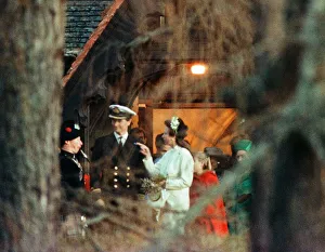 Images Dated 14th December 1992: A piper pipes as Princess Anne and Tim Laurence leave the church after their wedding