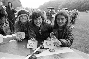 Images Dated 4th August 1985: Playing the 'planet game'at a rain soaked Brighouse Fun Day were (from left
