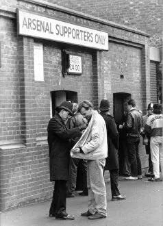 Images Dated 5th March 1990: Police checking a fans jacket outside Highbury. 5th March 1990