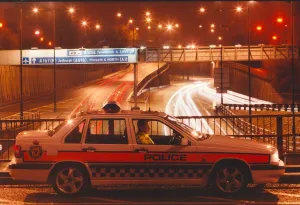 Images Dated 1st June 1995: A police officer watches the traffic whizz by in his patrol car 01 / 06 / 95 circa