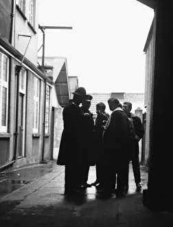00573 Gallery: Two police officers question a group of youths following a disturbance on Clacton sea