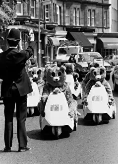Images Dated 14th June 1985: A policeman gestures to halt a rally of motor bears on C5s in London
