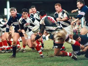 Pontypridd's Dale McIntosh passes the ball to Matthew Lloyd. March 1997 Pontypridd's Dale McIntosh passes the ball to Matthew Lloyd. March 1997