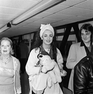 Images Dated 5th November 1983: Pop group Culture Club arrive at Heathrow Airport from Madrid. Pictured, Boy George